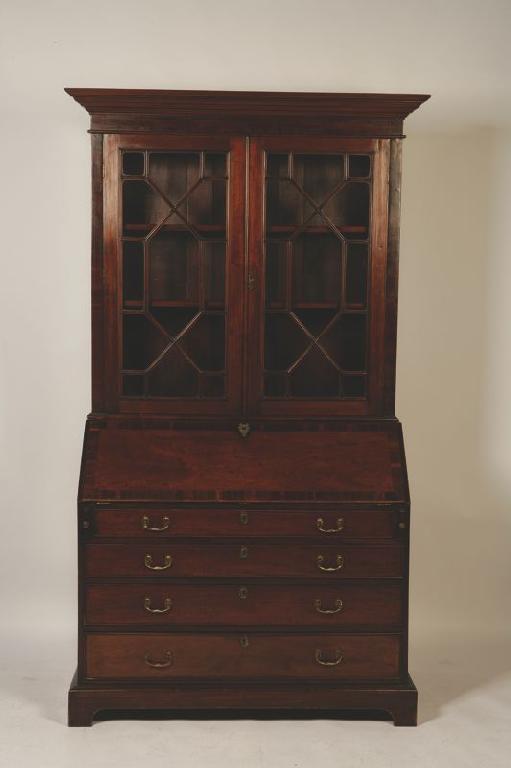 Appraisal: A GEORGE III MAHOGANY BUREAU BOOKCASE the upper section with