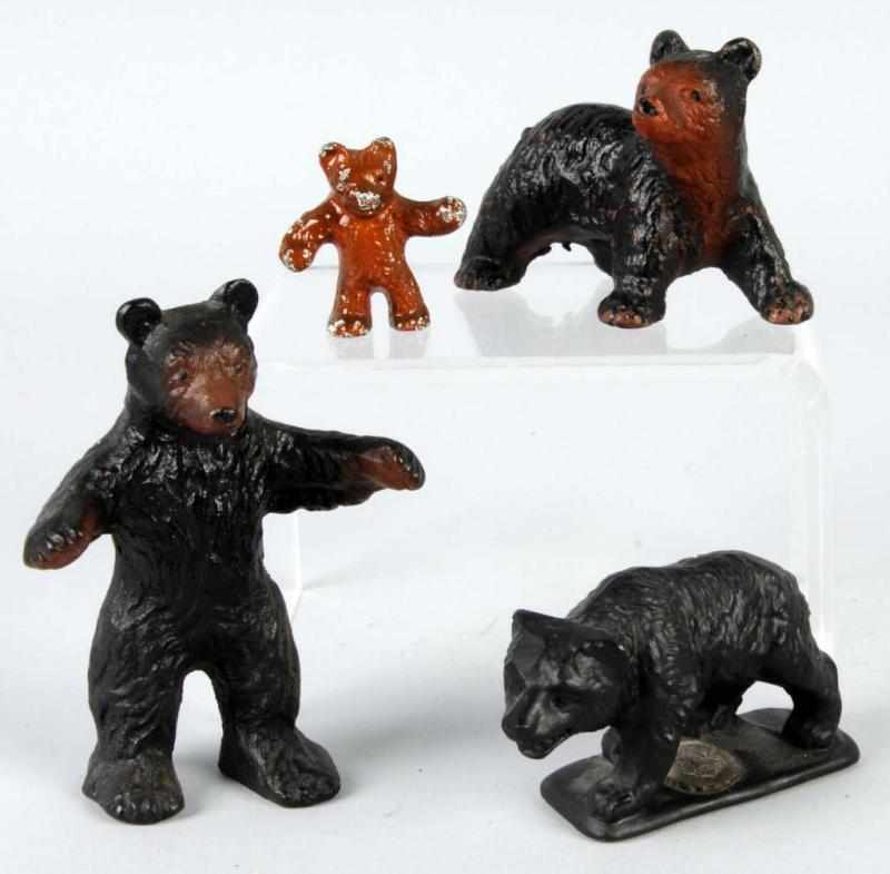 Appraisal: Lot of Cast Iron Bear Paperweights Description Includes assorted bears