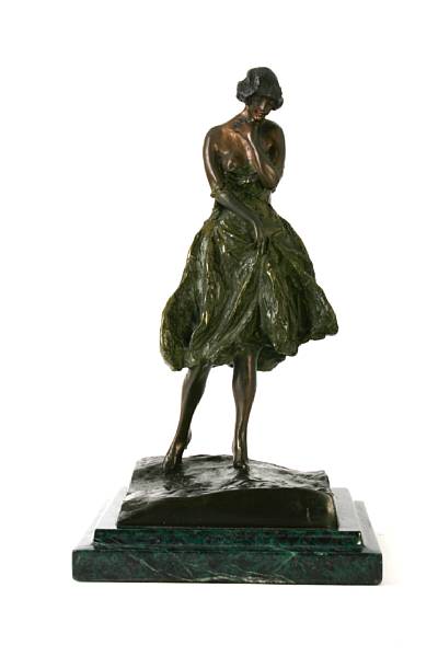 Appraisal: A bronze figure of a scantly clad maiden height in