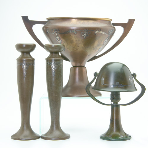 Appraisal: HEINTZ SILVERCREST Four silver-on-bronze items including a Heintz trophy with