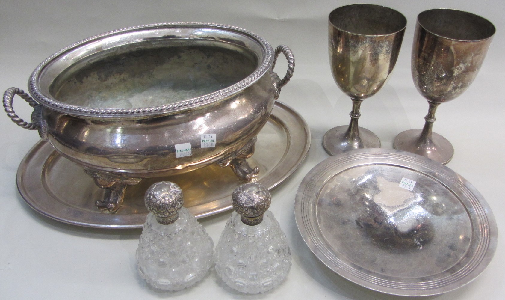 Appraisal: Two similar Victorian silver mounted faceted glass scent bottles the