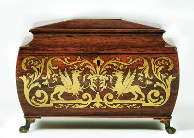 Appraisal: A REGENCY ROSEWOOD AND BRASS INLAID TEA CADDY of sarcophagus