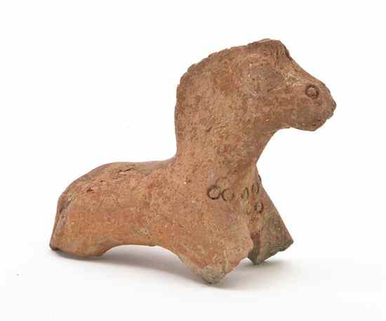 Appraisal: A Mediterranean Figural Pottery Fragment depicting a horse with impressed