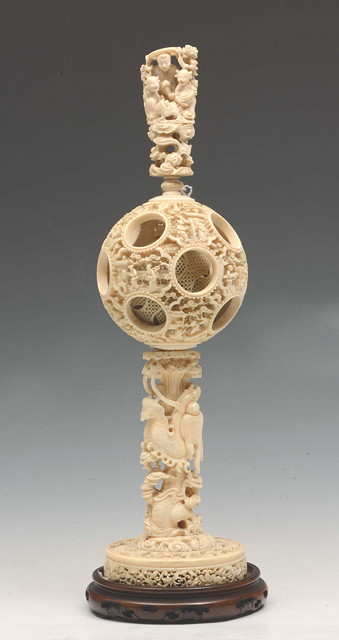 Appraisal: A CHINESE CANTON CARVED IVORY PUZZLE BALL on stand having