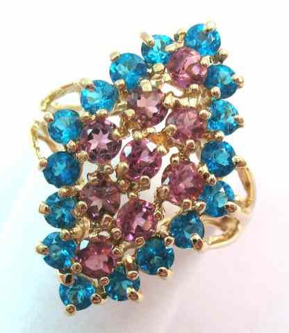 Appraisal: PINK AND BLUE TOPAZ RING k yellow gold set with