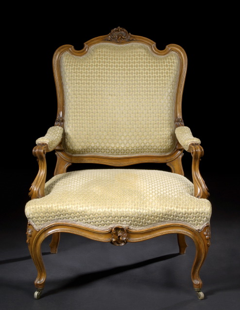 Appraisal: Provincial Louis XV-Style Fruitwood Fauteuil fourth quarter th century the