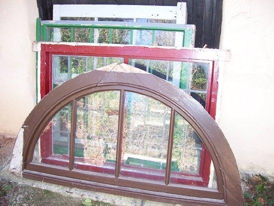 Appraisal: An arch framed window panel cm wide overall and sundry