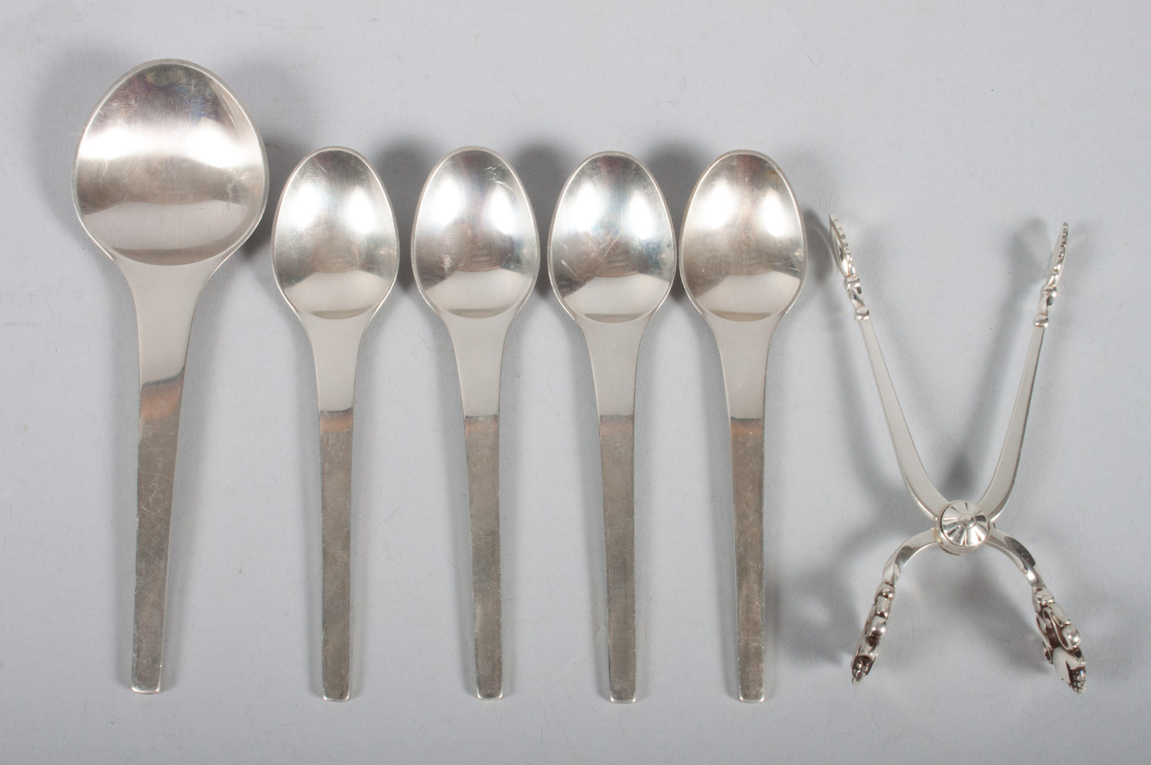 Appraisal: Six pieces of Georg Jensen sterling flatware including four Caravel