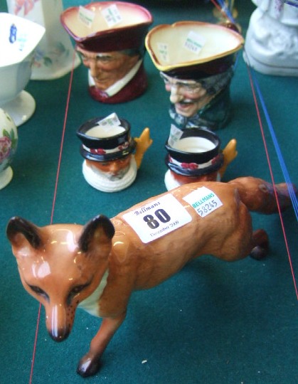 Appraisal: A Beswick figure of a fox a Doulton character jug