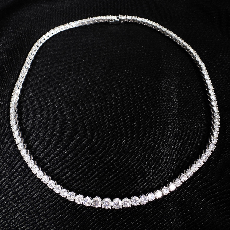 Appraisal: CT GRADUATED DIAMOND KT WHITE GOLD NECKLACE brilliant cut diamonds