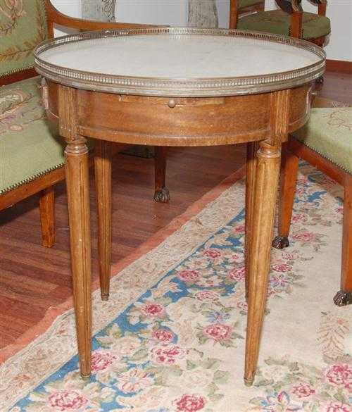 Appraisal: ROUND MAHOGANY SALON TABLE known as a table bouillotte late