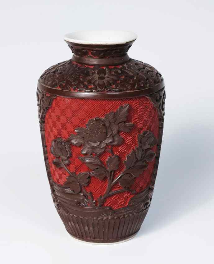 Appraisal: CARVED LACQUER CINNABAR ON PORCELAIN VASE '' tall