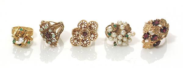 Appraisal: A collection of five gem-set and gold rings gross weight