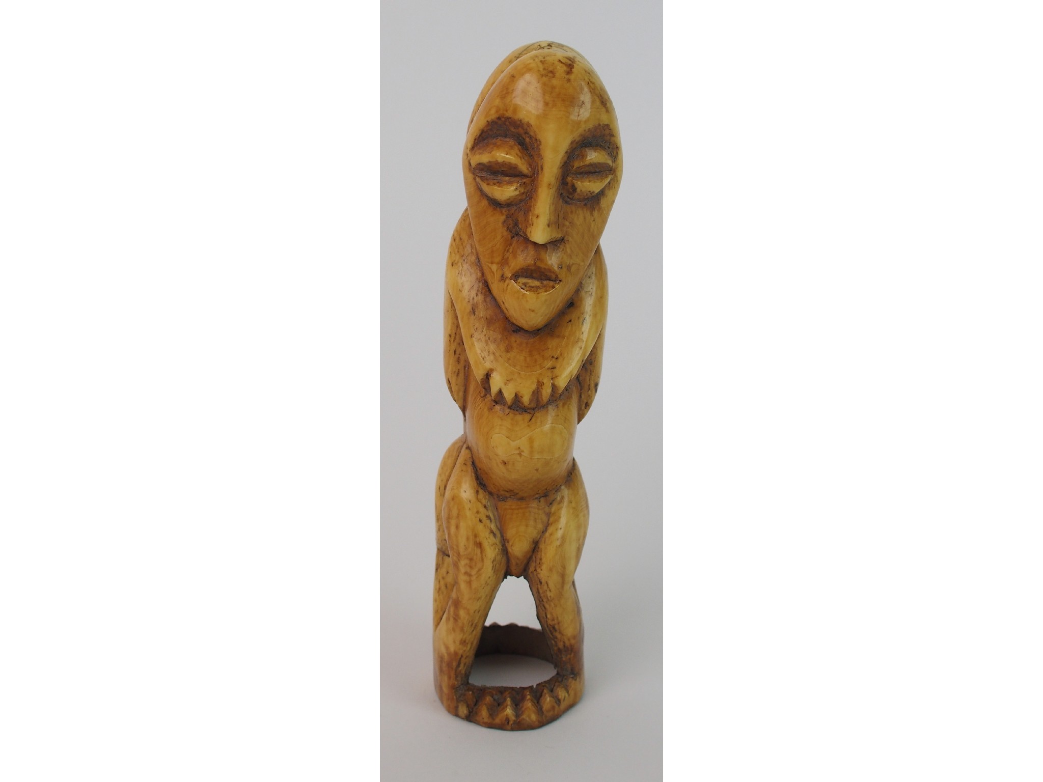 Appraisal: An African ivory tusk carving of a male and female