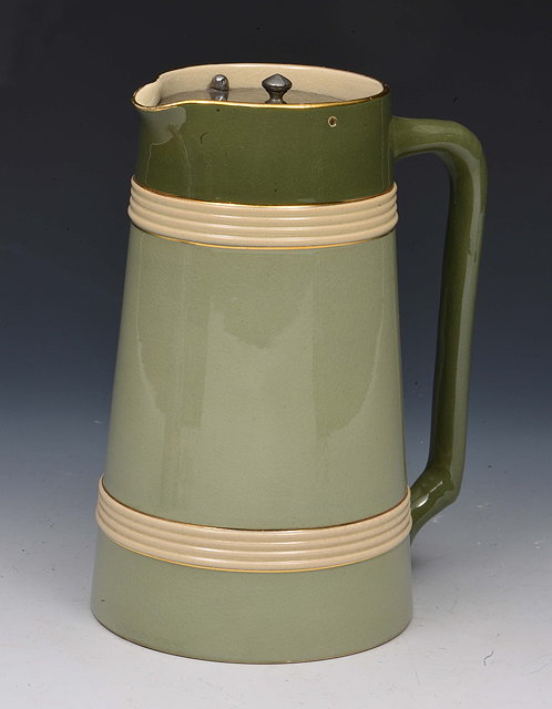 Appraisal: James Macintyre Co jugdecorated in two shades of green with