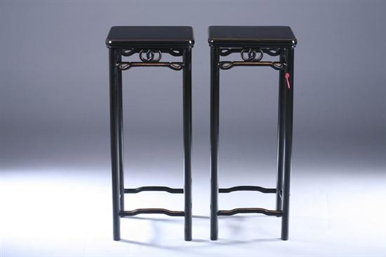 Appraisal: PAIR CHINESE BLACK LACQUERED ELMWOOD STANDS Square top above circular