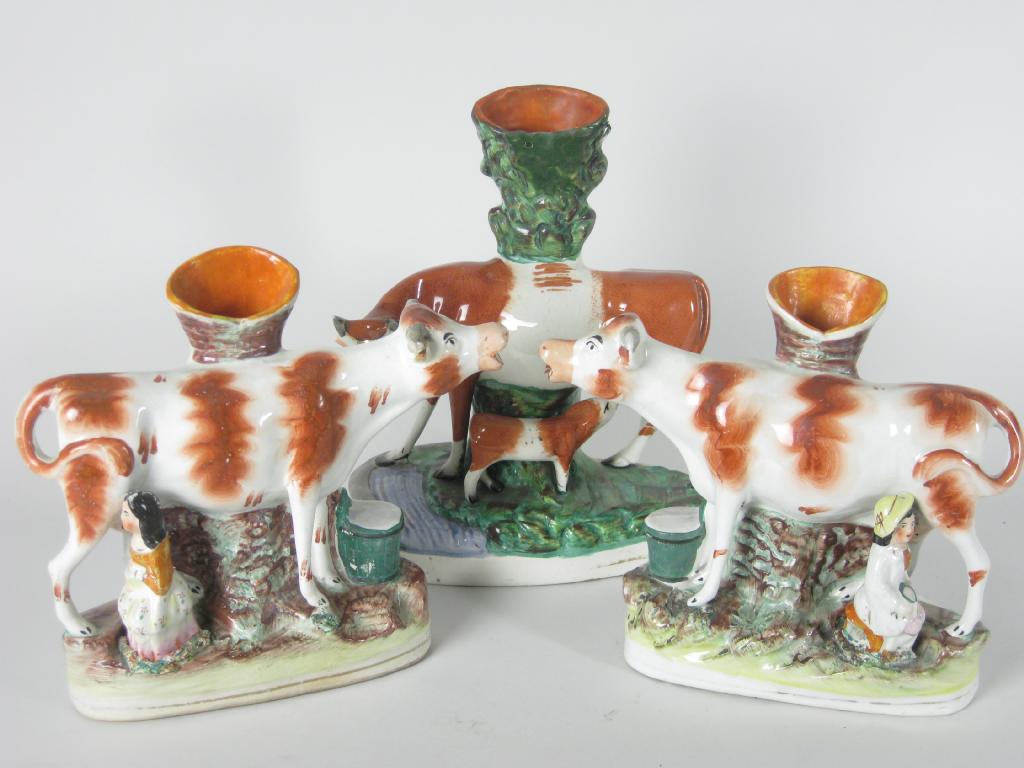 Appraisal: Pair of th Century Staffordshire Spill Vases each with brown