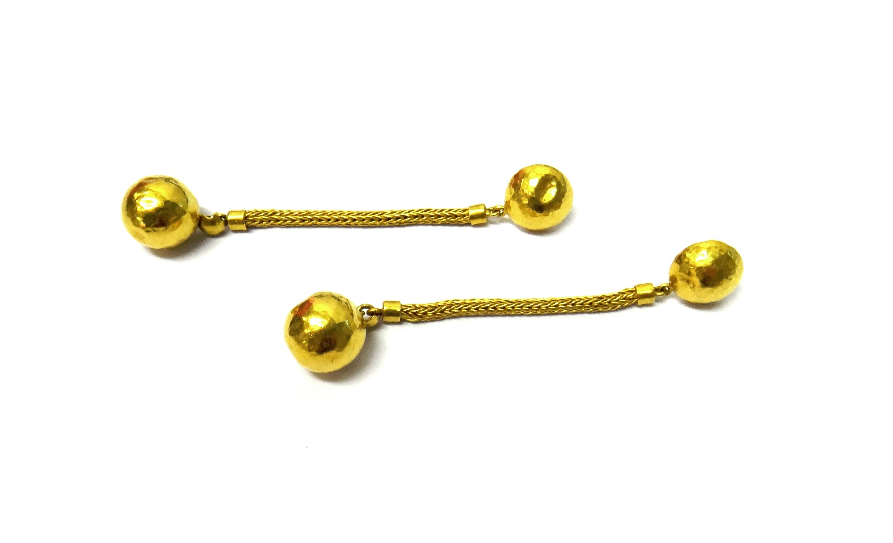 Appraisal: A pair of gold pendant earrings each with a hemispherical