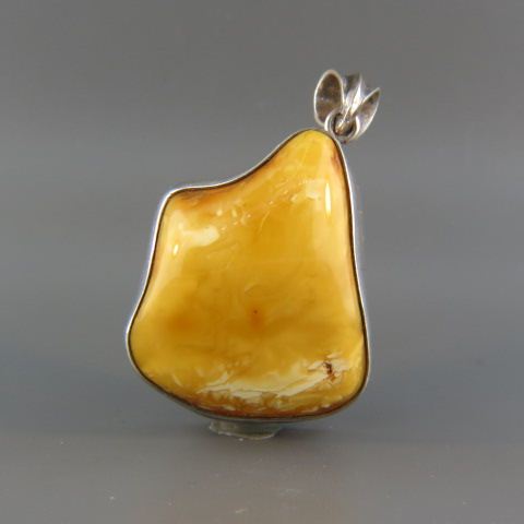 Appraisal: Amber Pendant fine Baltic butterscotch amber in sterling silver x