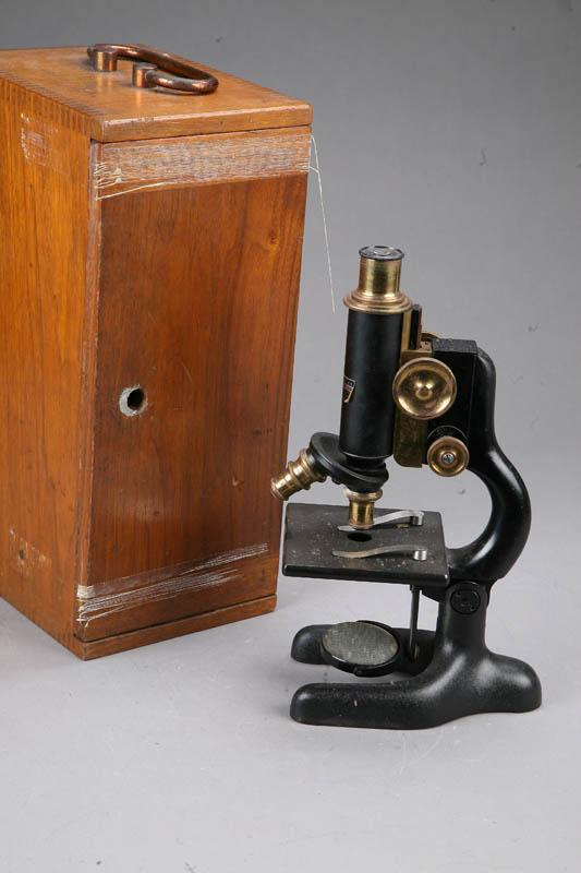 Appraisal: CASED MICROSCOPE Black painted microscope h In a dovetailed case