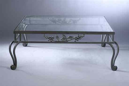 Appraisal: CONTEMPORARY CAST-METAL AND GLASS SQUARE-TOP LOW TABLE Inset glass top