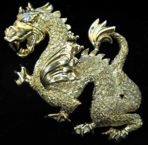 Appraisal: MAURICE KATZ SIGNED DIAMOND AND FOURTEEN KARAT GOLD DRAGON PENDANT