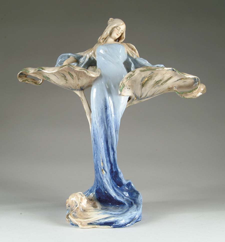 Appraisal: AMPHORA ART NOUVEAU FIGURINE Spectacular figurine features Art Nouveau maiden