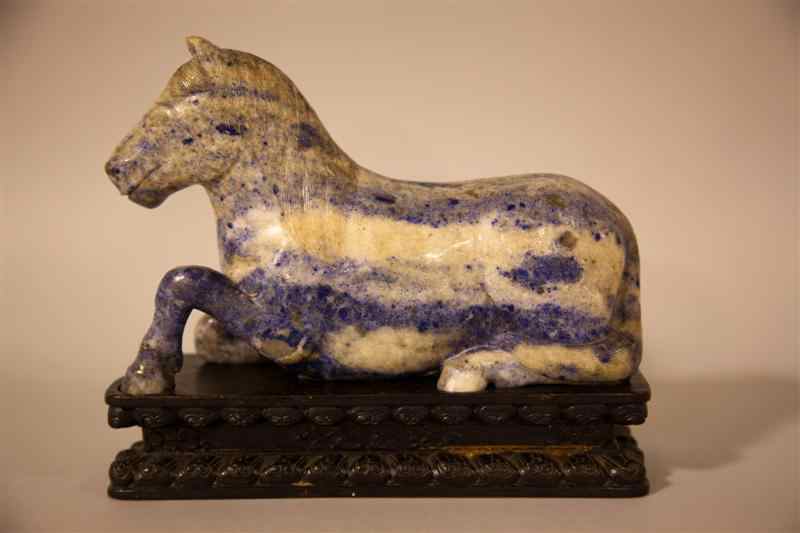 Appraisal: CHINESE LAPIS LAZULI MODEL OF A RECUMBENT HORSE Qianlong four-character