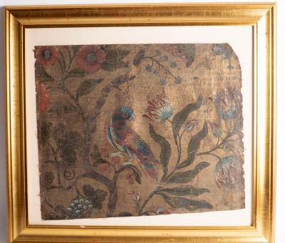 Appraisal: A framed th Century leather panel painted a parrot in