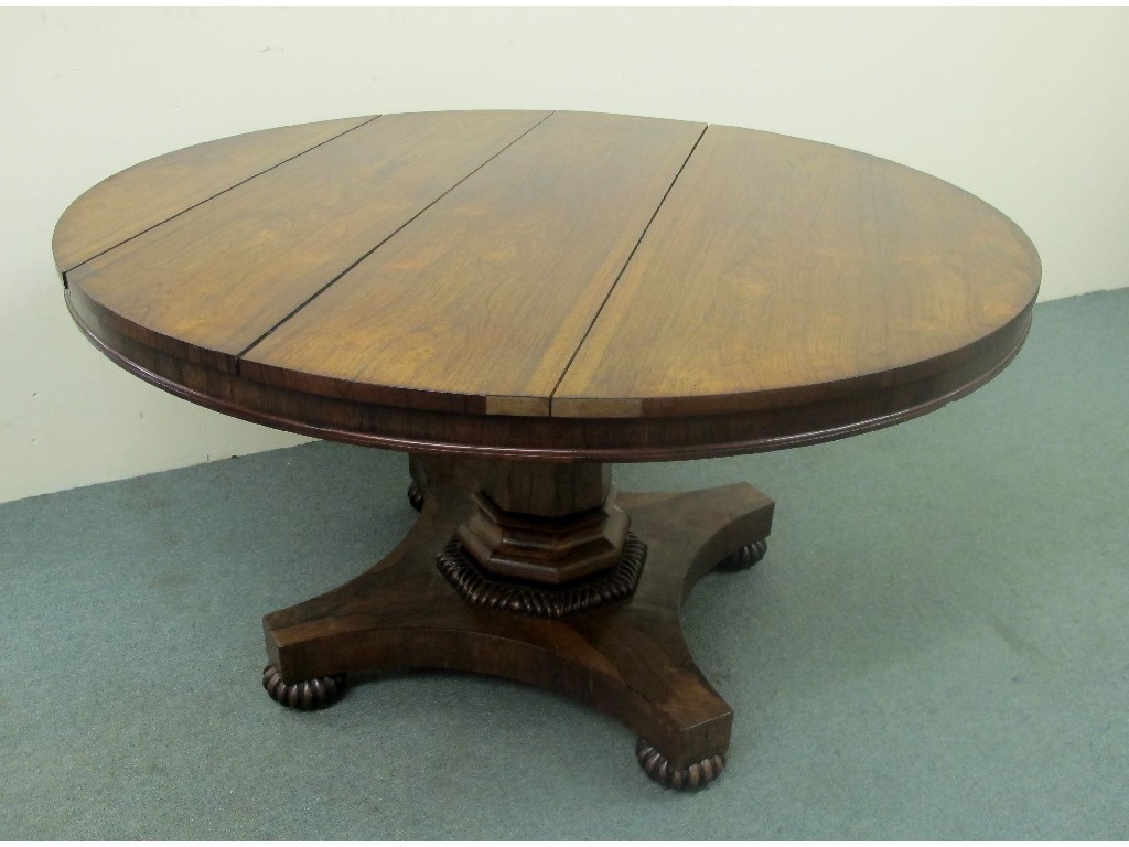 Appraisal: A Victorian rosewood breakfast table the circular top raised on