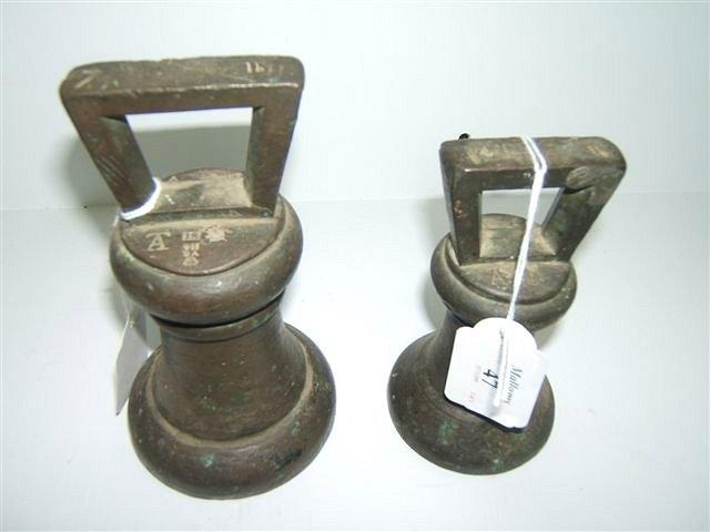 Appraisal: TWO ANTIQUE BRONZE BELL WEIGHTS one for lbs the other