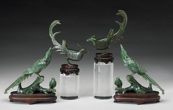 Appraisal: Four carved hardstone birds One pair featuring long turned-up tales