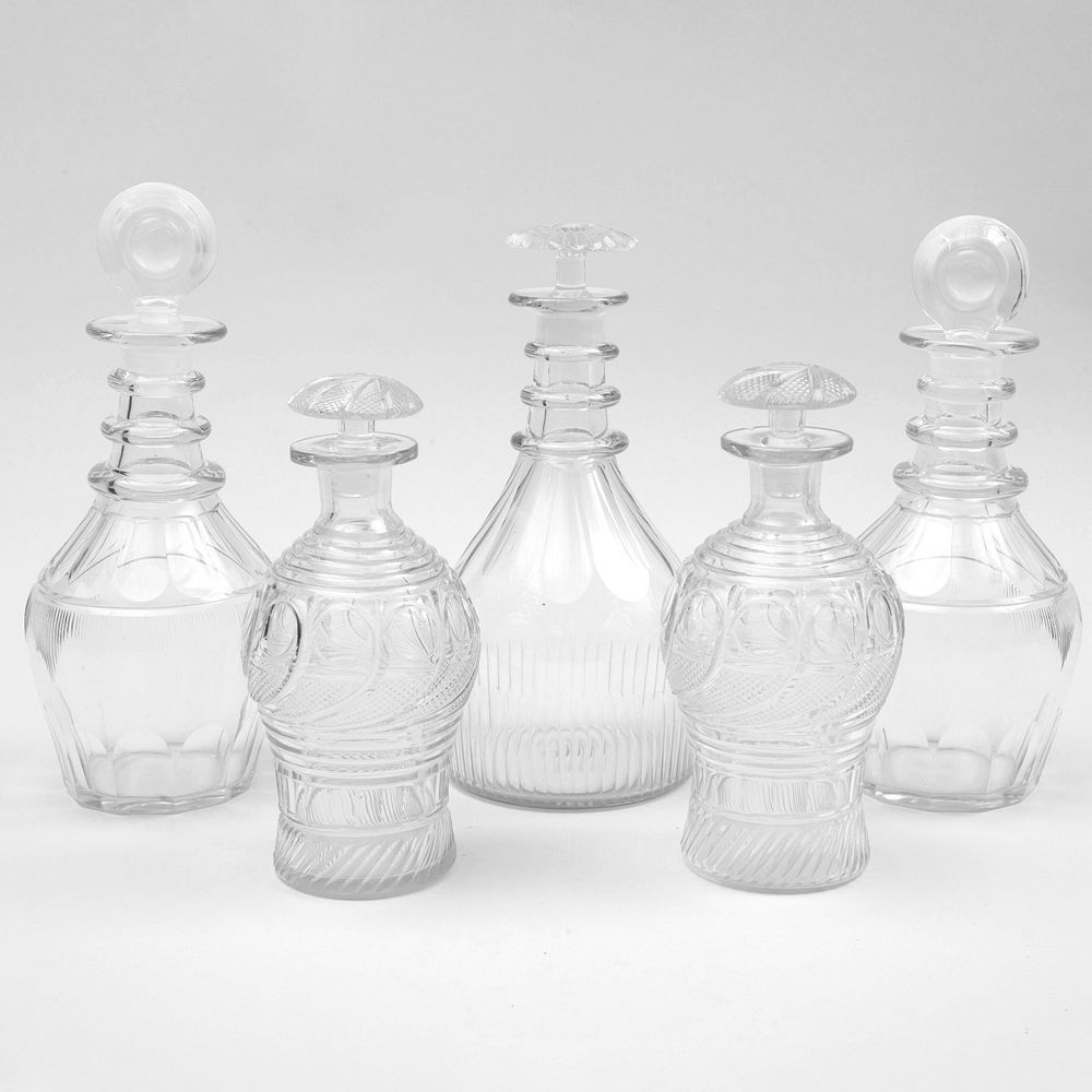 Appraisal: Group of Five Glass Decanters and Stoppers Comprising Two decanters