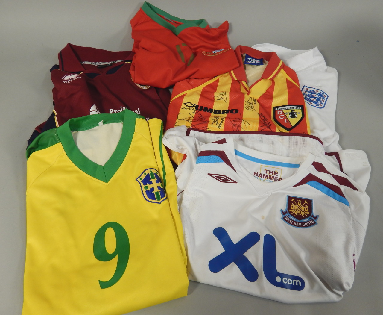 Appraisal: Various football jerseys to include a signed Racing Club Lens