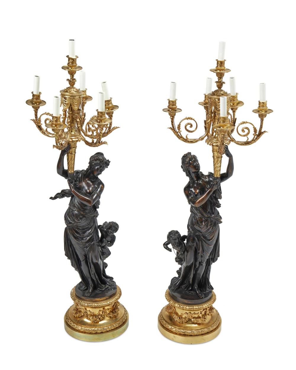 Appraisal: A pair of French bronze lamps Late th Early th