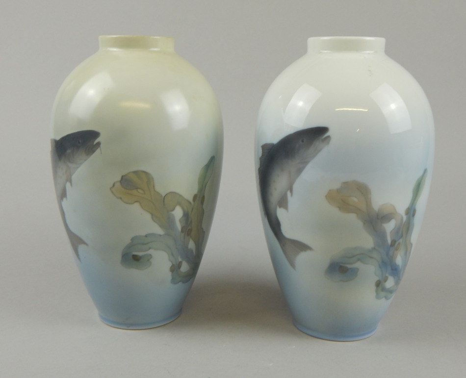 Appraisal: A near matching pair of Royal Copenhagen vases each decorated