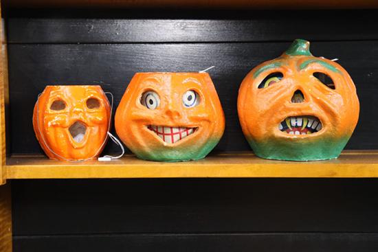 Appraisal: THREE PAPER MACHE JACK O'LANTERNS All with orange paint two