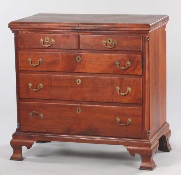 Appraisal: Walnut two over three graduated lipped drawer base reeded corner