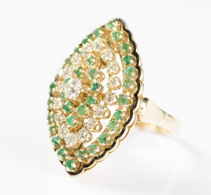 Appraisal: EMERALD DIAMOND AND FOURTEEN KARAT GOLD RING set with round-cut