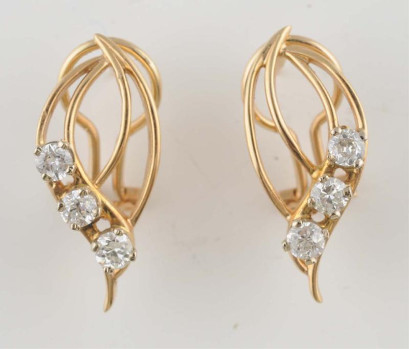 Appraisal: Clip-on Early earrings with three diamonds carat total Condition Excellent