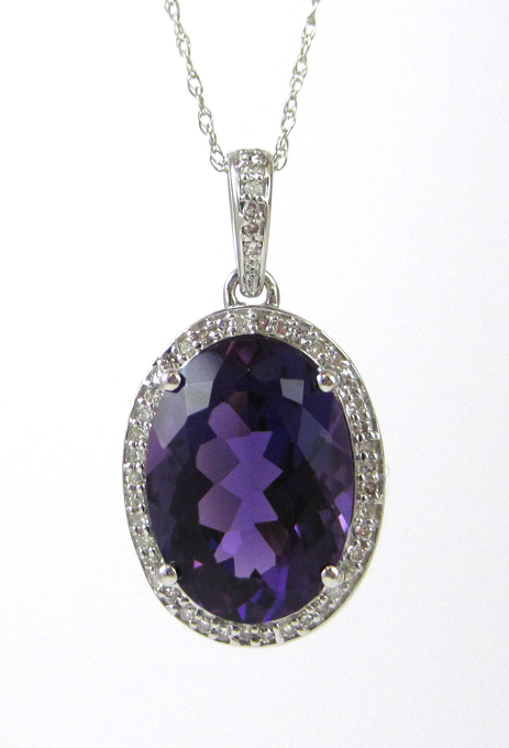 Appraisal: AMETHYST AND DIAMOND PENDANT NECKLACE having a k white gold