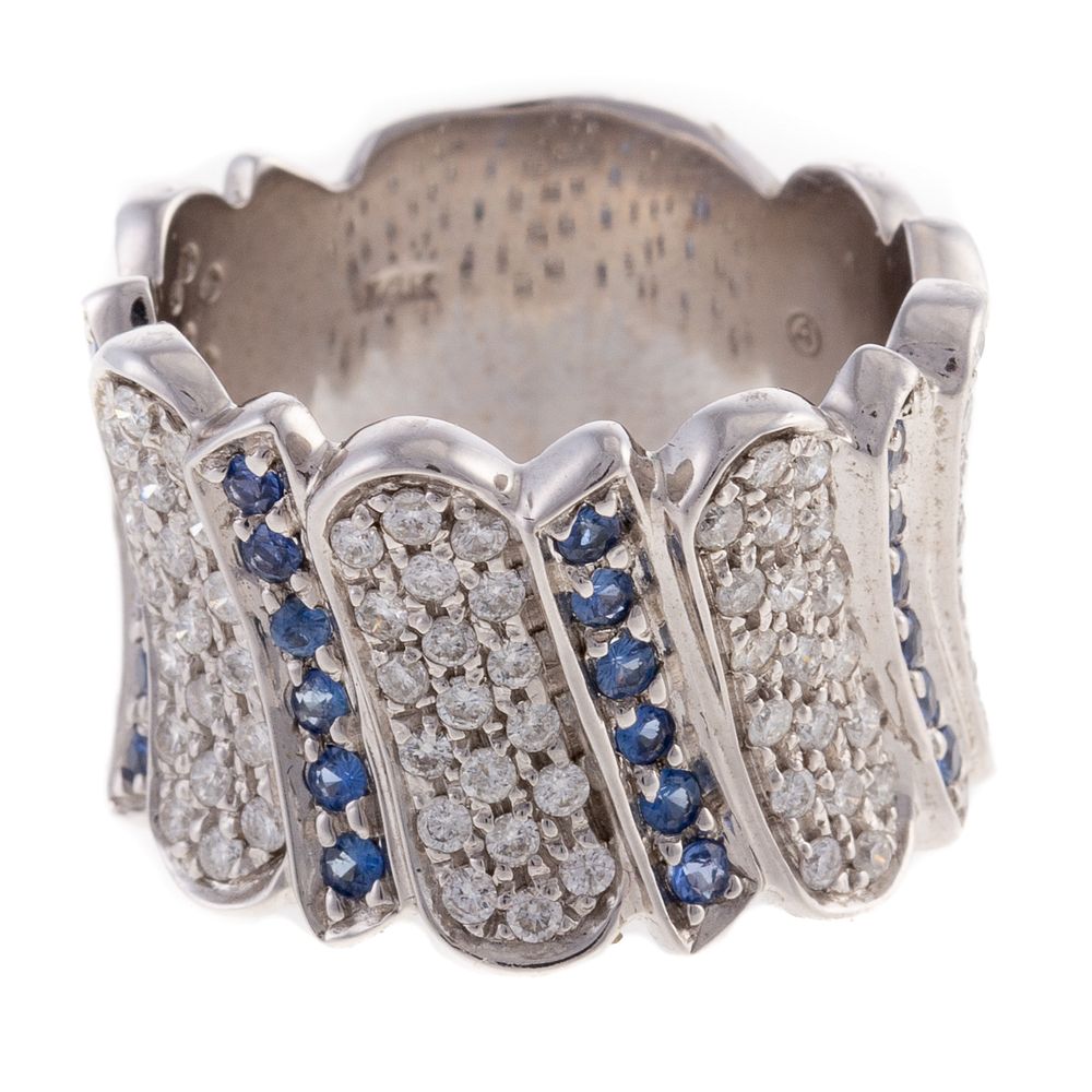 Appraisal: A Wide Pave Diamond Sapphire Band in K K white