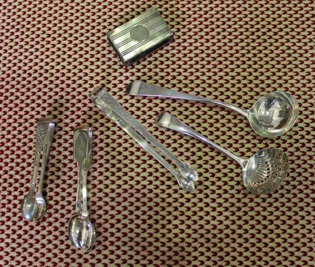 Appraisal: A GEORGIAN SILVER LADLE marks indistinguishable a pair of Georgian