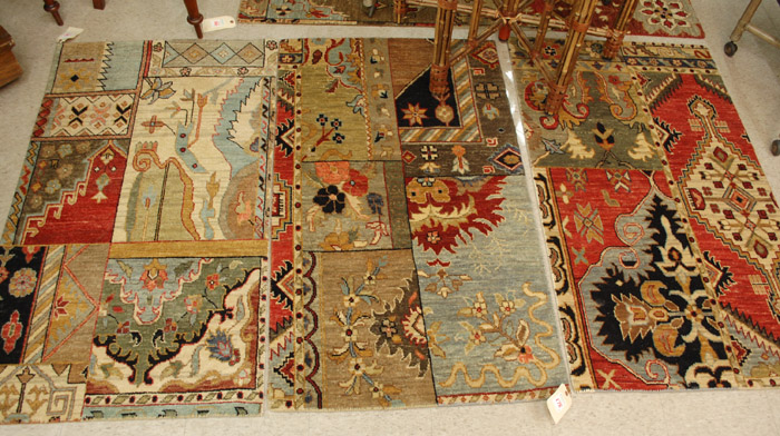 Appraisal: A SET OF THREE HAND KNOTTED ORIENTAL AREA RUGS Pakistani-Persians