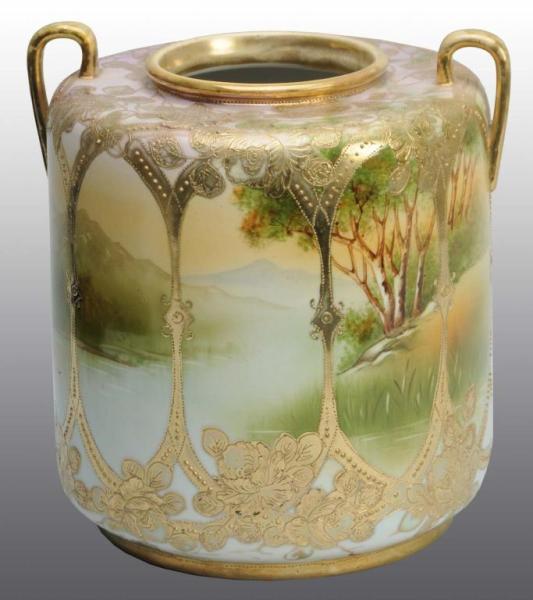 Appraisal: Large Nippon Vase with Lake Scene Description Heavy gold decoration