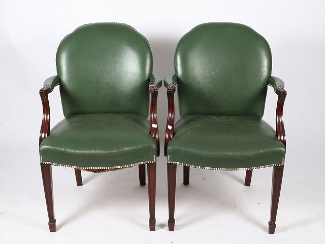 Appraisal: A PAIR OF MAHOGANY GEORGIAN STYLE GREEN LEATHER UPHOLSTERED OPEN