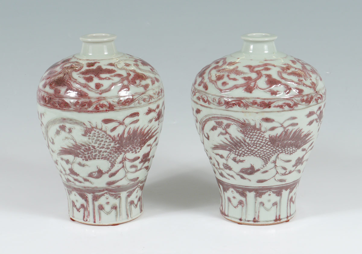 Appraisal: PAIR OF CHINESE CELADON VASES Relief red glaze foliate and