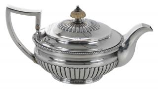 Appraisal: George III English Silver Teapot London round body with stop