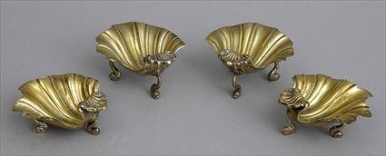 Appraisal: TWO GRADUATED PAIRS OF GOLD-PLATED SHELL-FORM DISHES The larger impressed