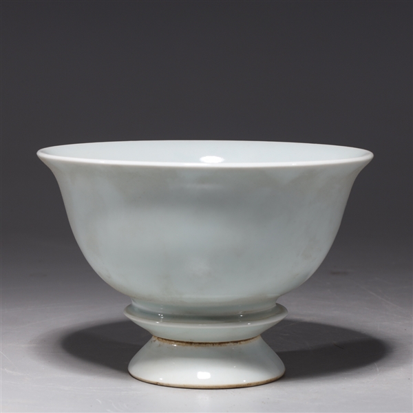 Appraisal: Chinese white glazed porcelain bowl on spinning base with blue